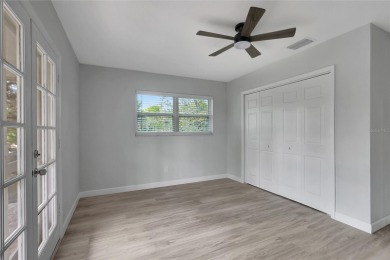Discover this beautifully renovated 4-bedroom, 3-bath,  dream on Temple Terrace Golf and Country Club in Florida - for sale on GolfHomes.com, golf home, golf lot