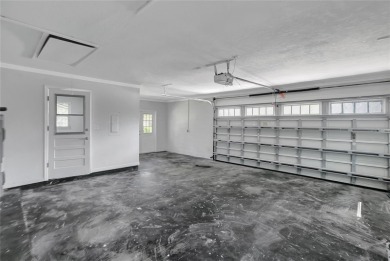Discover this beautifully renovated 4-bedroom, 3-bath,  dream on Temple Terrace Golf and Country Club in Florida - for sale on GolfHomes.com, golf home, golf lot