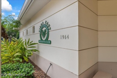 Live the good life in this upscale lakefront villa in Viera on Viera East Golf Club in Florida - for sale on GolfHomes.com, golf home, golf lot