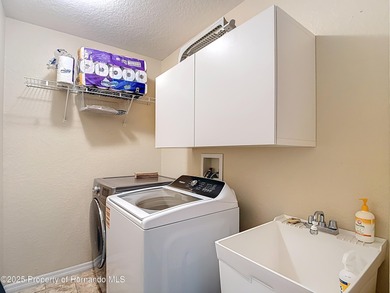 ONE OR MORE PHOTOS VIRTUALLY STAGED! Welcome to your dream home on Heritage Harbor Golf and Country Club in Florida - for sale on GolfHomes.com, golf home, golf lot