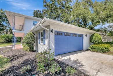 Discover this beautifully renovated 4-bedroom, 3-bath,  dream on Temple Terrace Golf and Country Club in Florida - for sale on GolfHomes.com, golf home, golf lot