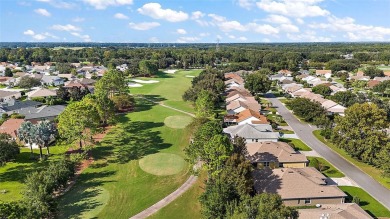 Under contract-accepting backup offers. Impressive 3/2 POOL home on Oakleigh Executive Golf Course in Florida - for sale on GolfHomes.com, golf home, golf lot