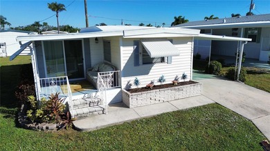 This 2-bedroom, 2-bathroom turnkey furnished mobile home in the on Heather Hills Golf Course in Florida - for sale on GolfHomes.com, golf home, golf lot