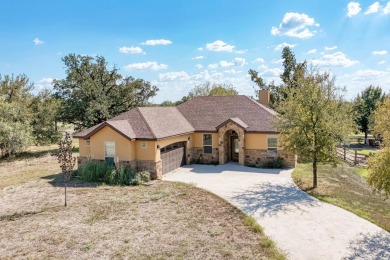 Spacious 3-bedroom, 2-bath home with a 2-car garage, perfectly on Packsaddle Country Club in Texas - for sale on GolfHomes.com, golf home, golf lot