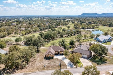 Spacious 3-bedroom, 2-bath home with a 2-car garage, perfectly on Packsaddle Country Club in Texas - for sale on GolfHomes.com, golf home, golf lot