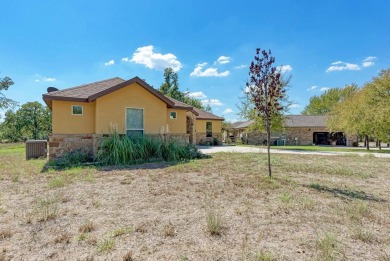 Spacious 3-bedroom, 2-bath home with a 2-car garage, perfectly on Packsaddle Country Club in Texas - for sale on GolfHomes.com, golf home, golf lot