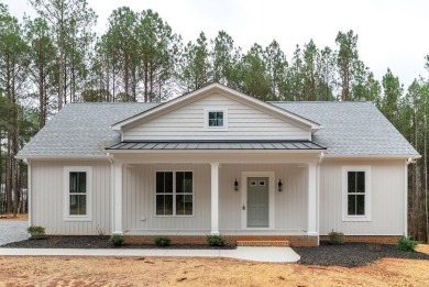 Welcome to this charming Cedar Creek floor plan, a craftsman on Tanglewood Shores Golf Club in Virginia - for sale on GolfHomes.com, golf home, golf lot