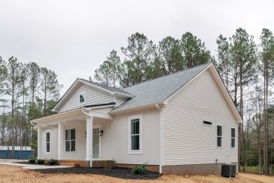 Welcome to this charming Cedar Creek floor plan, a craftsman on Tanglewood Shores Golf Club in Virginia - for sale on GolfHomes.com, golf home, golf lot
