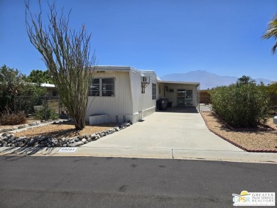 All you want is a cozy, comfortable place to live that is easy on Desert Crest Country Club in California - for sale on GolfHomes.com, golf home, golf lot