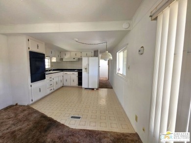 All you want is a cozy, comfortable place to live that is easy on Desert Crest Country Club in California - for sale on GolfHomes.com, golf home, golf lot