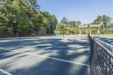 Build your dream home on this serene .61-acre lot in the on Carolina Colours Golf Club in North Carolina - for sale on GolfHomes.com, golf home, golf lot
