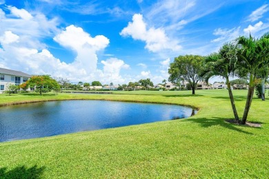 Gorgeous ground-level condo boasting picturesque panoramic lake on Polo Club of Boca Raton in Florida - for sale on GolfHomes.com, golf home, golf lot