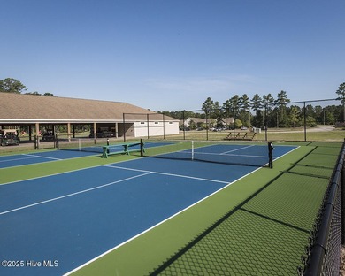 Build your dream home on this serene .61-acre lot in the on Carolina Colours Golf Club in North Carolina - for sale on GolfHomes.com, golf home, golf lot
