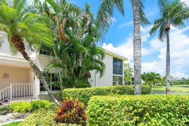 Gorgeous ground-level condo boasting picturesque panoramic lake on Polo Club of Boca Raton in Florida - for sale on GolfHomes.com, golf home, golf lot