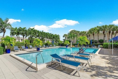 Gorgeous ground-level condo boasting picturesque panoramic lake on Polo Club of Boca Raton in Florida - for sale on GolfHomes.com, golf home, golf lot