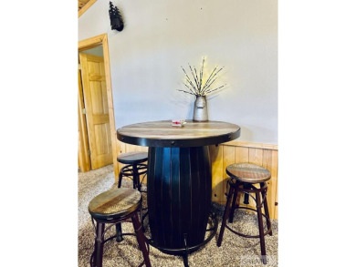 Prime Location & Turnkey Investment Opportunity. Nestled in the on Island Park Village Resort Golf Course in Idaho - for sale on GolfHomes.com, golf home, golf lot