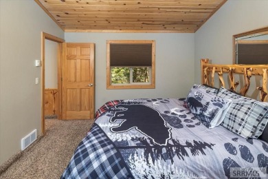 Prime Location & Turnkey Investment Opportunity. Nestled in the on Island Park Village Resort Golf Course in Idaho - for sale on GolfHomes.com, golf home, golf lot
