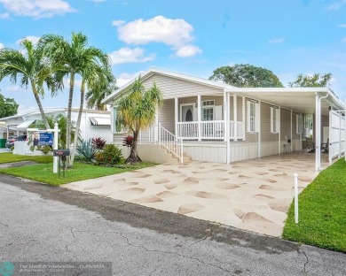 Discover your dream home in this beautifully renovated 3 bedroom on Davie Golf Club in Florida - for sale on GolfHomes.com, golf home, golf lot