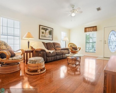 Discover your dream home in this beautifully renovated 3 bedroom on Davie Golf Club in Florida - for sale on GolfHomes.com, golf home, golf lot