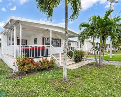 BEAUTIFUL manufactured home in Ravenswood Estates where you own on The Club at Emerald Hills in Florida - for sale on GolfHomes.com, golf home, golf lot