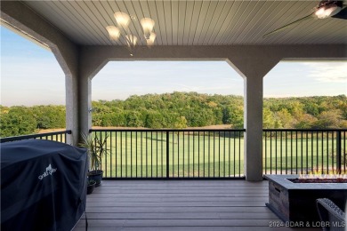 Discover luxury living in this stunning 4-bedroom, 3-bath villa on The Club At Old Kinderhook in Missouri - for sale on GolfHomes.com, golf home, golf lot