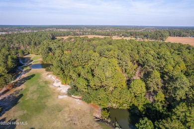 Larger 5 acre lot parcel heavily wooded adjacent to the Ocean on Sea Trail Golf Resort in North Carolina - for sale on GolfHomes.com, golf home, golf lot