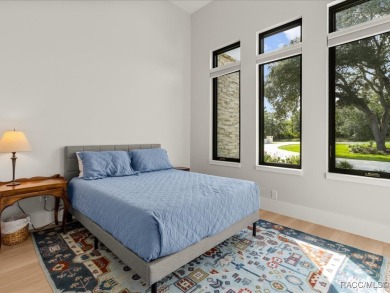 Luxury, efficiency, and elegance converge in this 2022 on Black Diamond Ranch Golf Course in Florida - for sale on GolfHomes.com, golf home, golf lot