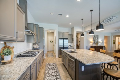 REDUCED! Enter this home through your private courtyard. This is on Poston Butte Golf Club in Arizona - for sale on GolfHomes.com, golf home, golf lot