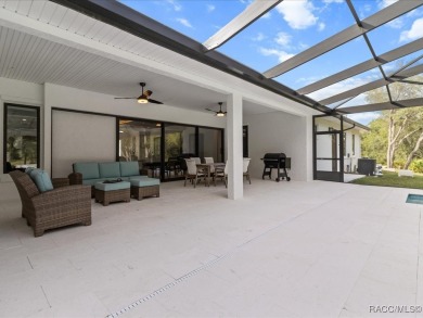 Luxury, efficiency, and elegance converge in this 2022 on Black Diamond Ranch Golf Course in Florida - for sale on GolfHomes.com, golf home, golf lot