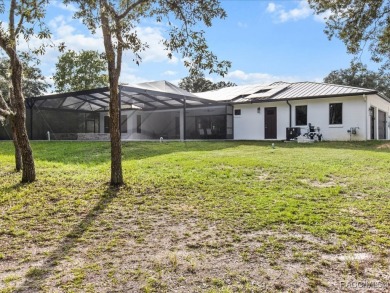 Luxury, efficiency, and elegance converge in this 2022 on Black Diamond Ranch Golf Course in Florida - for sale on GolfHomes.com, golf home, golf lot
