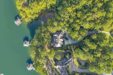 Set on a private 1.12-acre cul-de-sac lot, this expanded and on The Reserve At Lake Keowee in South Carolina - for sale on GolfHomes.com, golf home, golf lot
