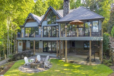 Set on a private 1.12-acre cul-de-sac lot, this expanded and on The Reserve At Lake Keowee in South Carolina - for sale on GolfHomes.com, golf home, golf lot