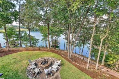 Set on a private 1.12-acre cul-de-sac lot, this expanded and on The Reserve At Lake Keowee in South Carolina - for sale on GolfHomes.com, golf home, golf lot
