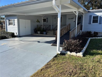 Discover this delightful home in a highly sought-after 55+ golf on Zellwood Station Country Club in Florida - for sale on GolfHomes.com, golf home, golf lot