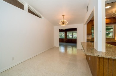This is a lovely mid-century ranch style home.  3 bedrooms, 2 on Temple Terrace Golf and Country Club in Florida - for sale on GolfHomes.com, golf home, golf lot