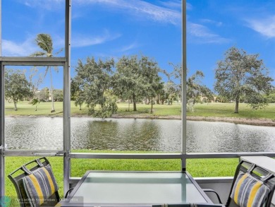 JUST SIT ON YOU SCREENED BALCONY AND ENJOY THIS BEAUTIFUL VIEW on Lauderhill Golf Course in Florida - for sale on GolfHomes.com, golf home, golf lot