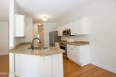 This well-kept 4 bed, 3 bath home is nestled in the heart of on Pinehurst Golf Course No. 8 in North Carolina - for sale on GolfHomes.com, golf home, golf lot