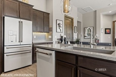 Gorgeous home with stunning golf and mesa views in the desirable on Falcon Ridge Golf Course in Nevada - for sale on GolfHomes.com, golf home, golf lot