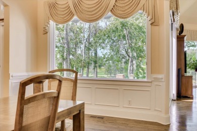 Stately home with stunning views overlooking Spalding Lake on Woodside Plantation Country Club in South Carolina - for sale on GolfHomes.com, golf home, golf lot