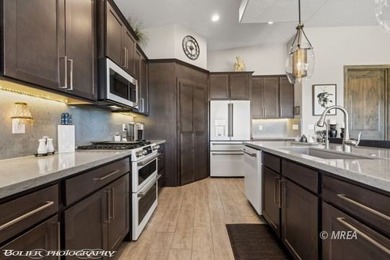 Gorgeous home with stunning golf and mesa views in the desirable on Falcon Ridge Golf Course in Nevada - for sale on GolfHomes.com, golf home, golf lot