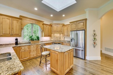 Stately home with stunning views overlooking Spalding Lake on Woodside Plantation Country Club in South Carolina - for sale on GolfHomes.com, golf home, golf lot