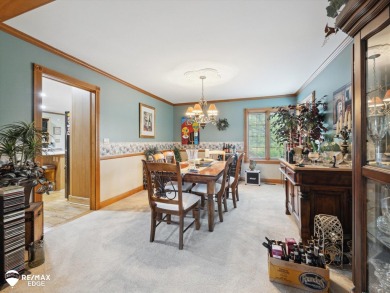 Set on nearly half an acre in Grand Blanc's sought-after Warwick on Warwick Hills Golf and Country Club in Michigan - for sale on GolfHomes.com, golf home, golf lot