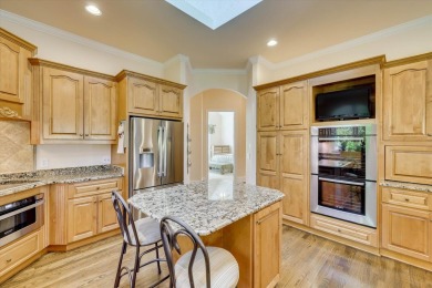 Stately home with stunning views overlooking Spalding Lake on Woodside Plantation Country Club in South Carolina - for sale on GolfHomes.com, golf home, golf lot