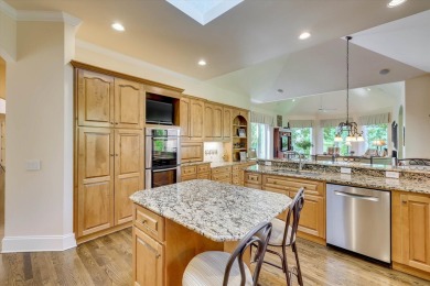 Stately home with stunning views overlooking Spalding Lake on Woodside Plantation Country Club in South Carolina - for sale on GolfHomes.com, golf home, golf lot