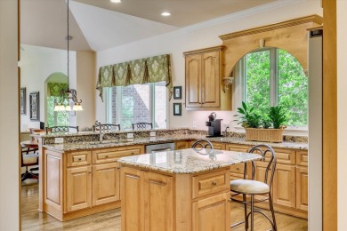 Stately home with stunning views overlooking Spalding Lake on Woodside Plantation Country Club in South Carolina - for sale on GolfHomes.com, golf home, golf lot