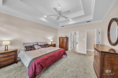 Beautiful meticulously maintained LOW maintenance home and yard on Peninsula Golf and Racquet Club in Alabama - for sale on GolfHomes.com, golf home, golf lot