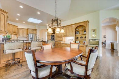 Stately home with stunning views overlooking Spalding Lake on Woodside Plantation Country Club in South Carolina - for sale on GolfHomes.com, golf home, golf lot