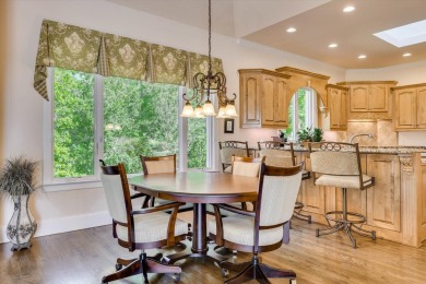 Stately home with stunning views overlooking Spalding Lake on Woodside Plantation Country Club in South Carolina - for sale on GolfHomes.com, golf home, golf lot
