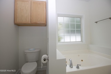 This well-kept 4 bed, 3 bath home is nestled in the heart of on Pinehurst Golf Course No. 8 in North Carolina - for sale on GolfHomes.com, golf home, golf lot