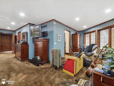 Set on nearly half an acre in Grand Blanc's sought-after Warwick on Warwick Hills Golf and Country Club in Michigan - for sale on GolfHomes.com, golf home, golf lot